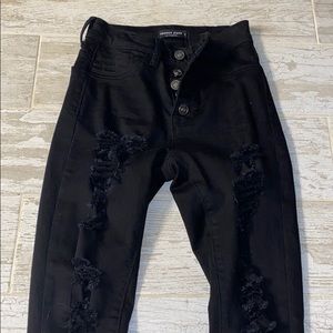 Ripped black skinny jeans